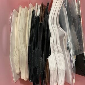 Assorted Avon and Mark Paper delivery Bags in Black, White